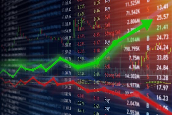 A screen shows the movement of stocks up and down