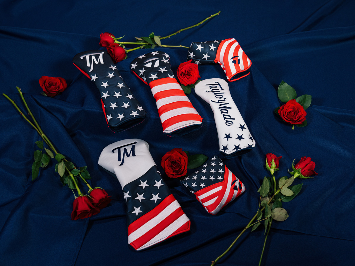 Women's Summer Commemorative Headcovers, with red white and blue star and stripe designs, on a navy blue blanket, with red roses scattered around each.