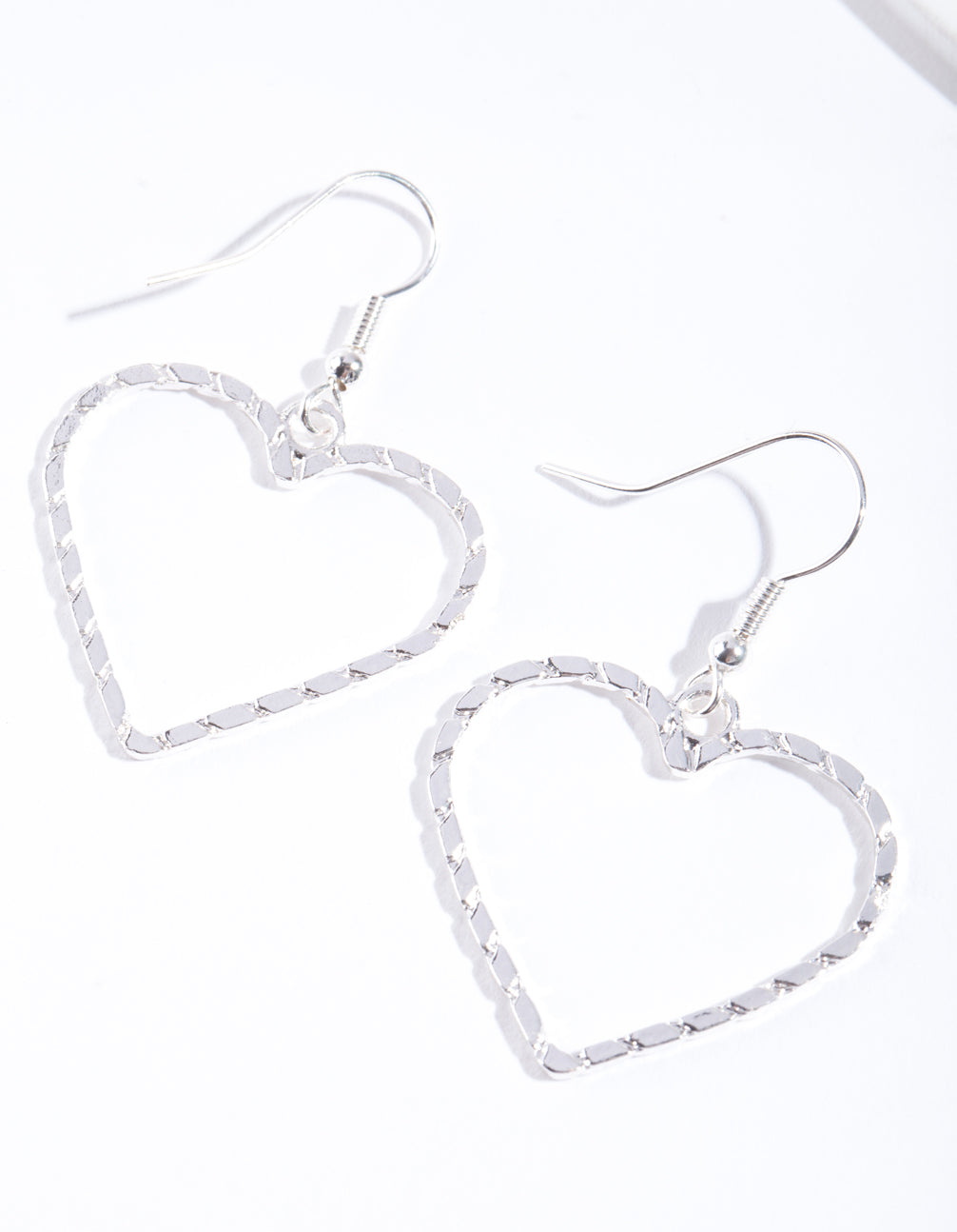 Image of Silver Textured Heart Cut Out Drop Earring