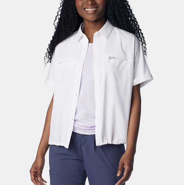 A woman in a short sleeve button up.