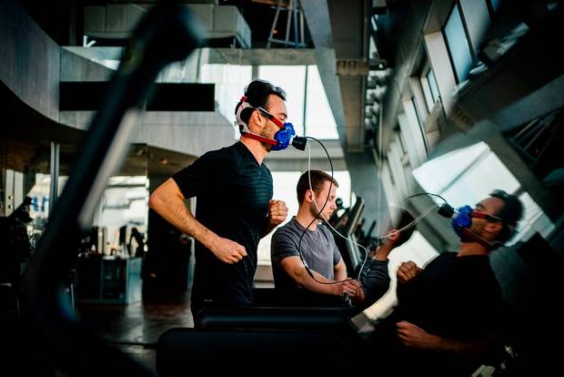 Igor Korabelnikov exercises on a treadmill wearing a facemask to analyse the gases in his breath at a gym that calls itself a "biohacking laboratory"