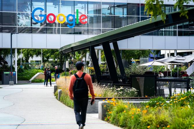 An employee walking in Google's campus in California