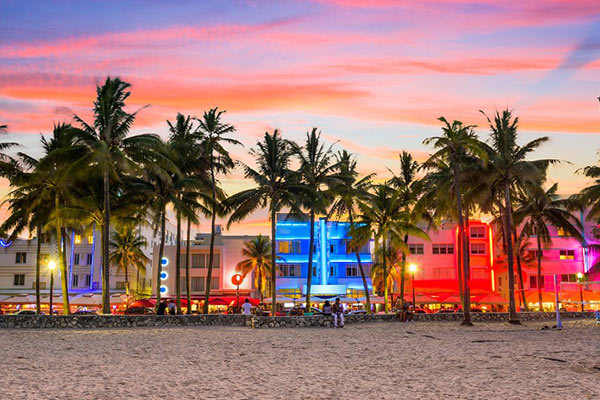 A nighttime shot of hotels along Ocean Drive on Miami's South Beach