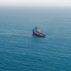 an oil ship crosses the water