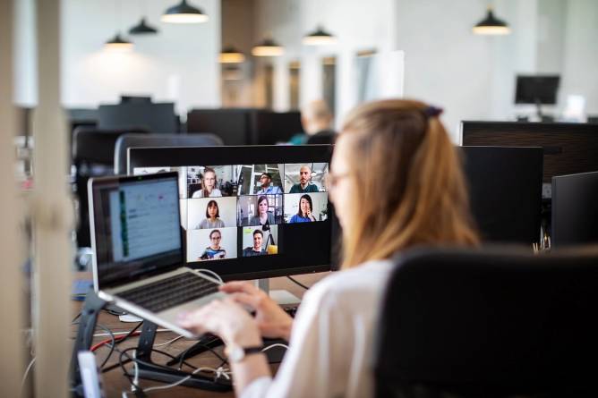 A worker on a camera on Zoom call