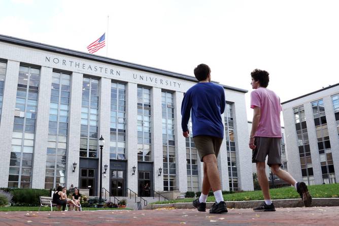 Students walk Northeastern University campus on September 14, 2022 in Boston, Massachusetts