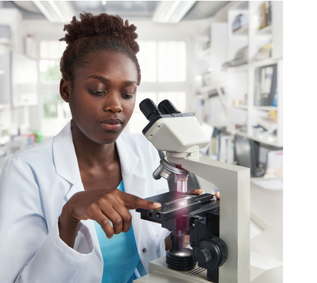 Woman looking in microscope