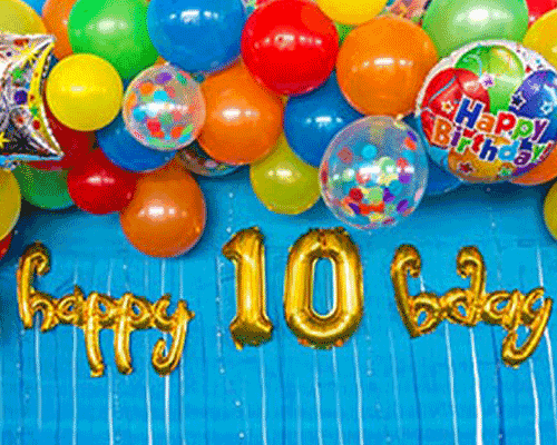 Blog idea: giant colorful balloon arch with gold balloons spelling out &#x22;happy 10th bday&#x22;