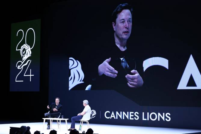 Elon Musk and Mark Read attend ‘Exploring the New Frontiers of Innovation: Mark Read in Conversation with Elon Musk’ session during the Cannes Lions International Festival Of Creativity 2024 - Day Three on June 19, 2024 in Cannes, France.