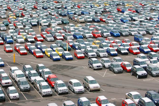 New Suzuki cars and vans parked at Avonmouth docks near Bristol, UK