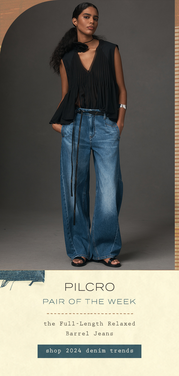 Woman wearing PILCRO barrel jeans. Shop 2024 denim trends.