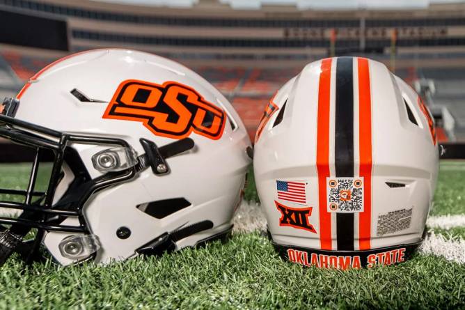 Oklahoma State University's football helmets with QR codes for NIL donations