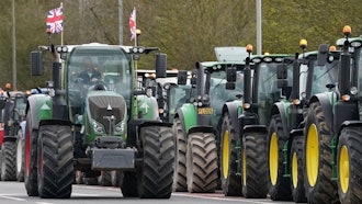 A convoy of farmers in tractors gather on the A20 near Wrotham, England, March 25, 2024.