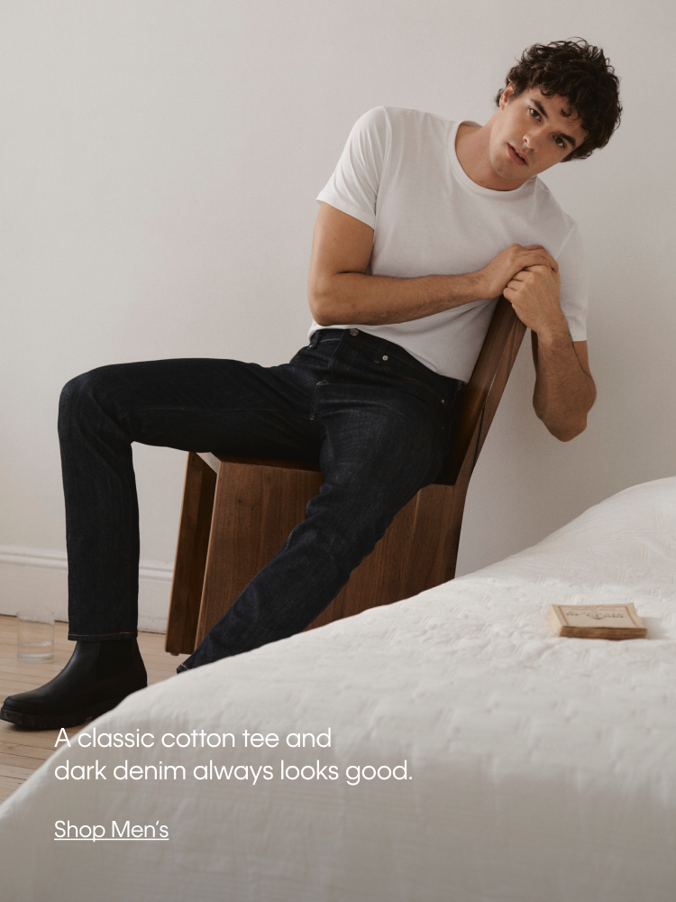 A classic cotten tee and dark denim always looks good.