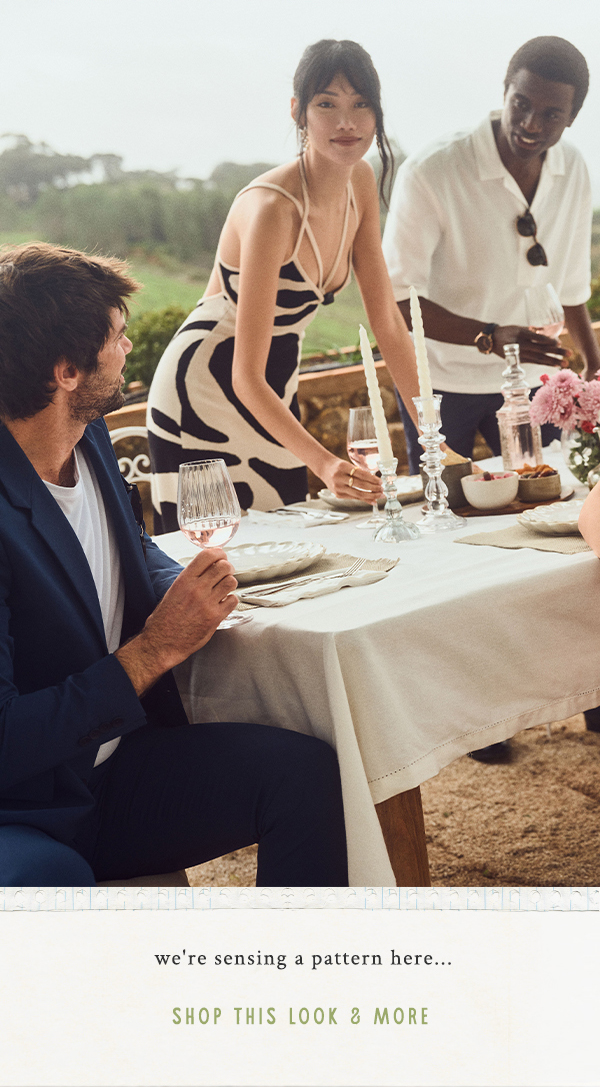 Woman in black and white dress. Shop this look and more.