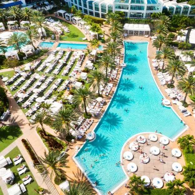 Aerial view of resort-style pool and lounge chairs at the Fontainebleau Miami Beach