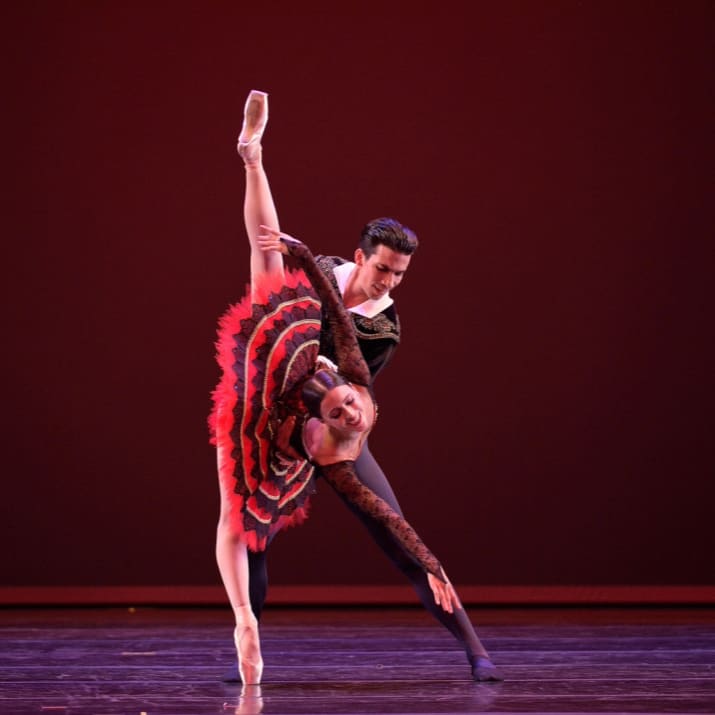 A man and woman dancing ballet