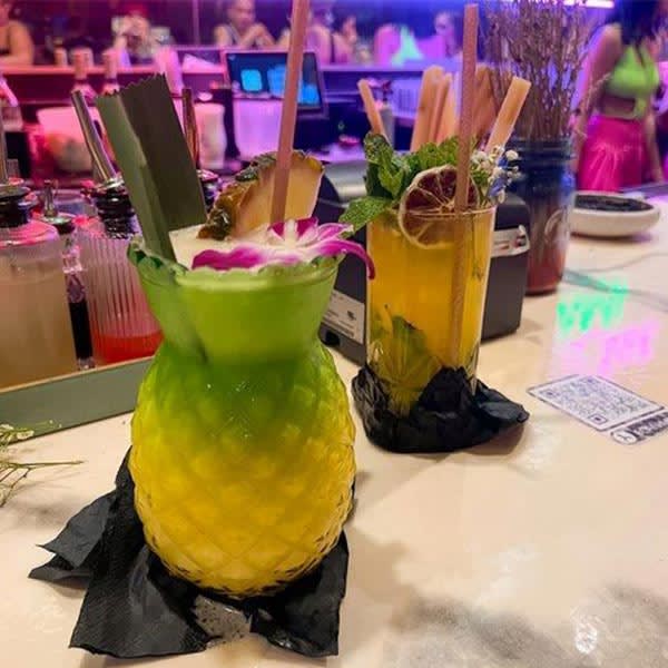 A tropical drink served in a pineapple