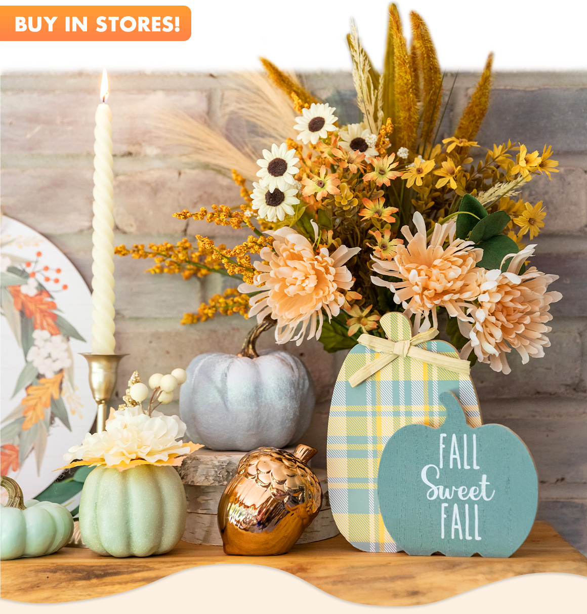 A mantel styled with decorative pumpkins, fall signs, candles, faux florals, and more