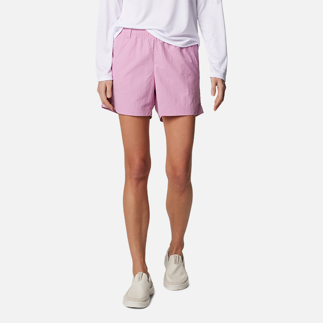 Pink shorts on a model.