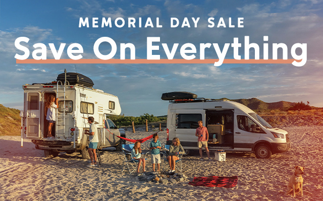 A group of people having fun on the beach, RV-ing and vanlifing.