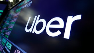 Uber logo above a trading post on the floor of the New York Stock Exchange, Aug. 16, 2019.