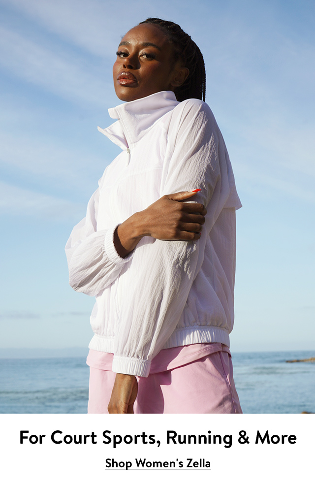 Woman wearing a parka and shorts