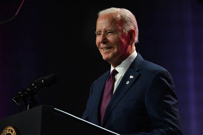 President Joe Biden speaking at a podium