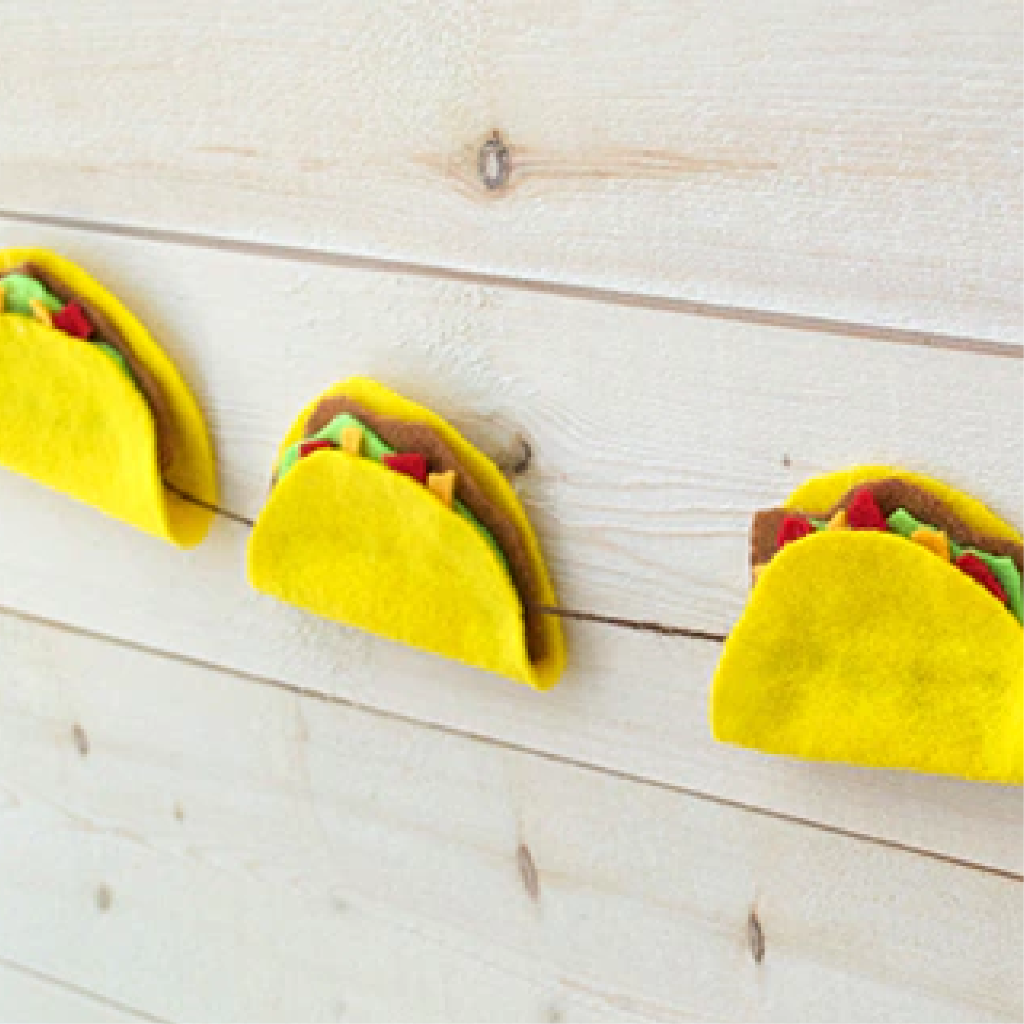 Blog idea: DIY taco garland on a wooden wall