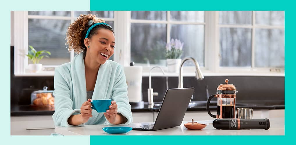 woman having coffee in the kitchen