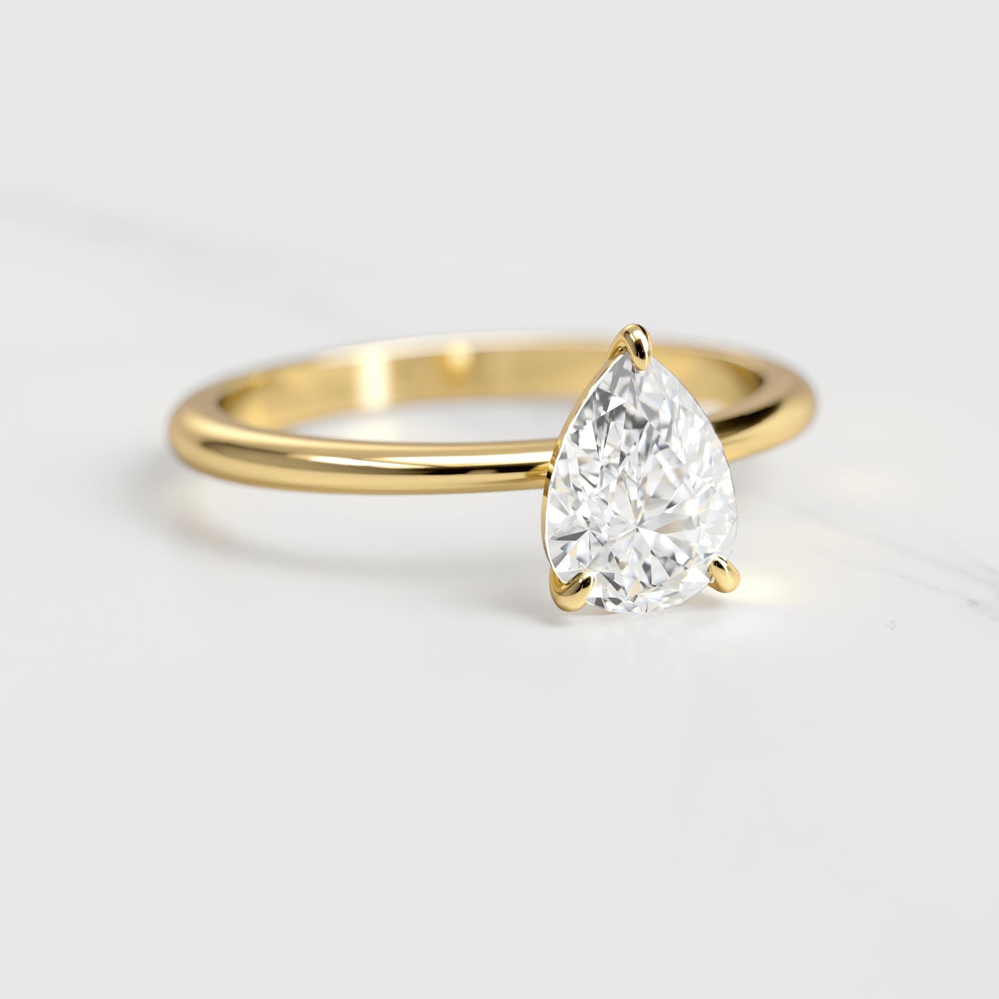 Image of Pear Tapered Solitaire Diamond Ring