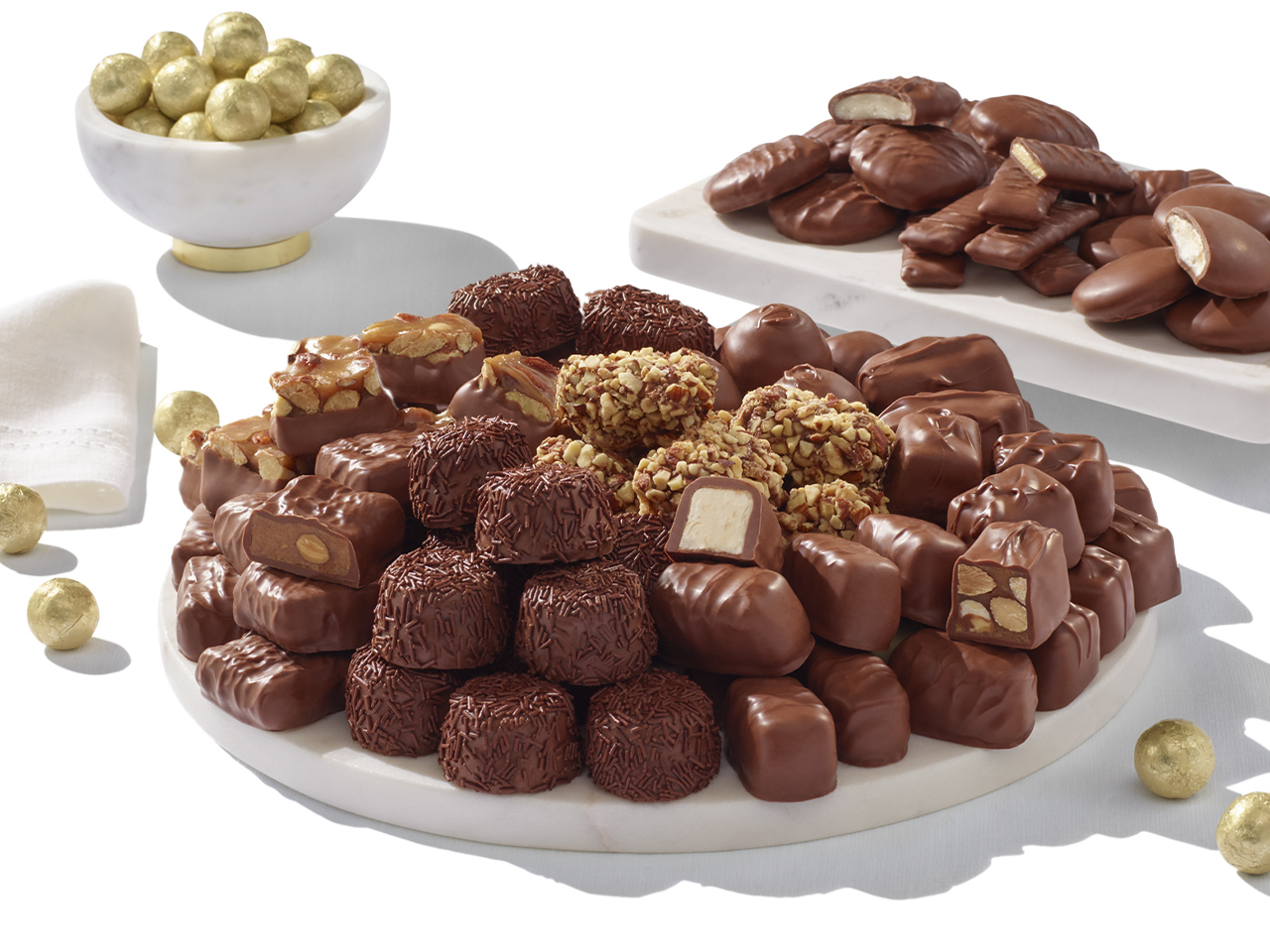 Stacks of Milk Chocolates Arranged on Trays