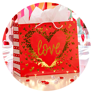 Valentine's Day gift bag with &#x22;love&#x22; written on the front