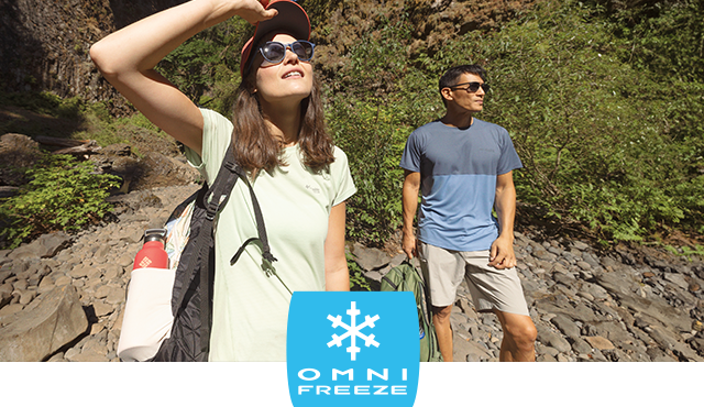 Woman and man hiking in gear with cooling technologies. Keep your cool. 