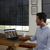 black cordless solar shades in breakfast nook