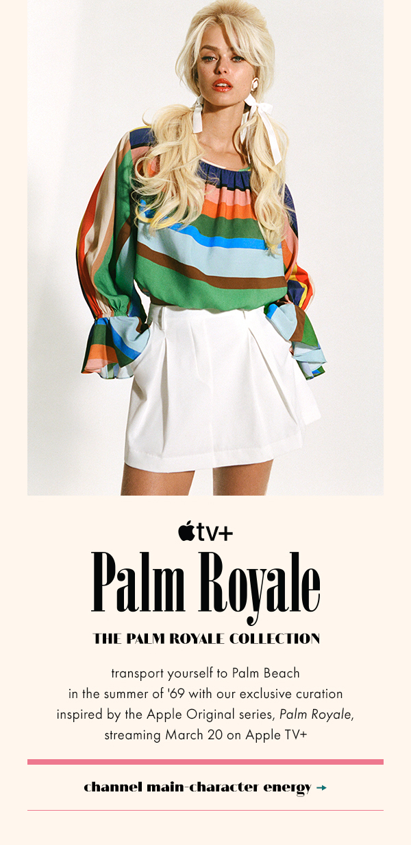 Woman wearing striped flowy blouse and white mini skirt. AppleTV+ Palm Royale collection. Shop the collab.