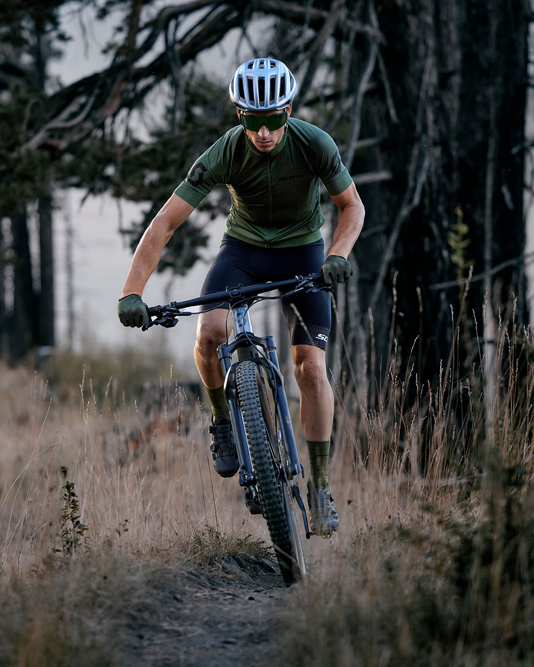 A man riding with the SCOTT XC collection gear