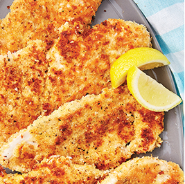 air-fried chicken breast with two lemon wedges