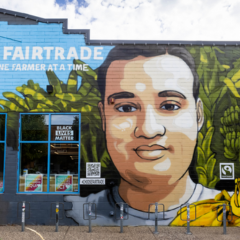 A mural of Johnny Gabriel Navas Aquim that portrays him alongside bananas and the Fairtrade Mark.