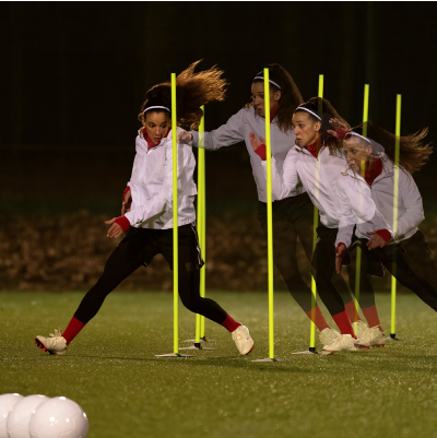 Woman playing soccer.