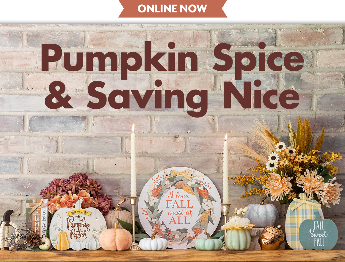 A mantel styled with decorative pumpkins, fall signs, candles, faux florals, and more