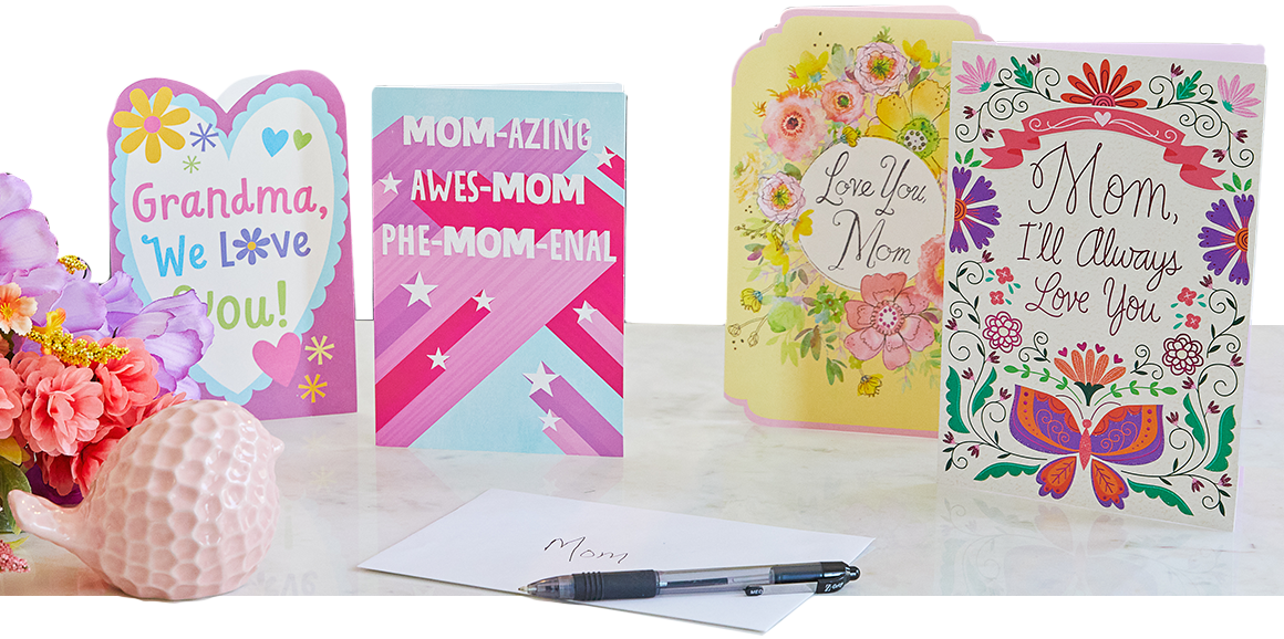 Variety of Mother's Day cards on a table