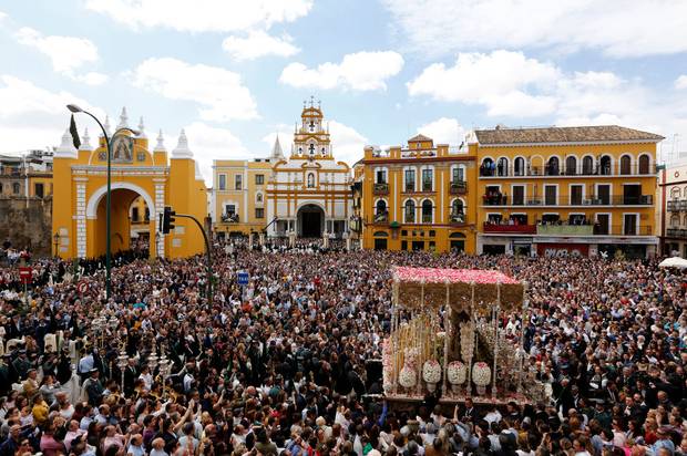 Virgin of La Macarena brotherhood is seen during a Holy Week procession on April 19, 2019 in Seville, Spain. 