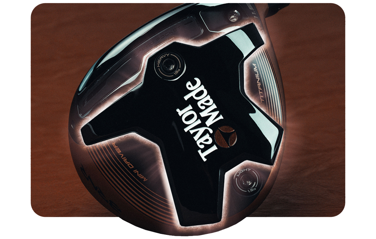 bottom of the Copper BRNR Mini Driver showing the star shape of the precise turf interaction with a glowing hue around it