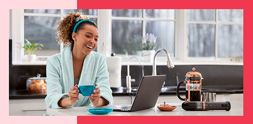 woman having coffee in kitchen