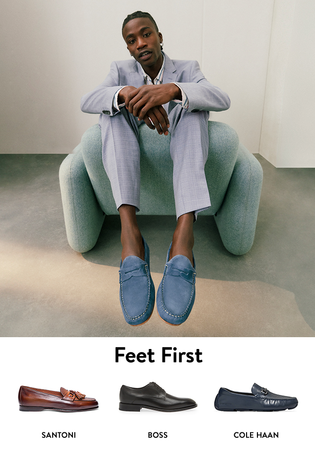 Man wearing a suit and blue loafers. Santoni tasseled loafer, BOSS classic derby and Cole Haan perforated driving loafer.