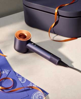 Dyson Supersonic hair dryer in Prussian blue and Rich copper