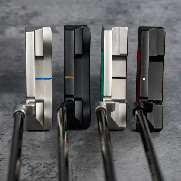 4 different colorways and finishes of MyTP putters, showing the top sightlines of the putters in a studio setting