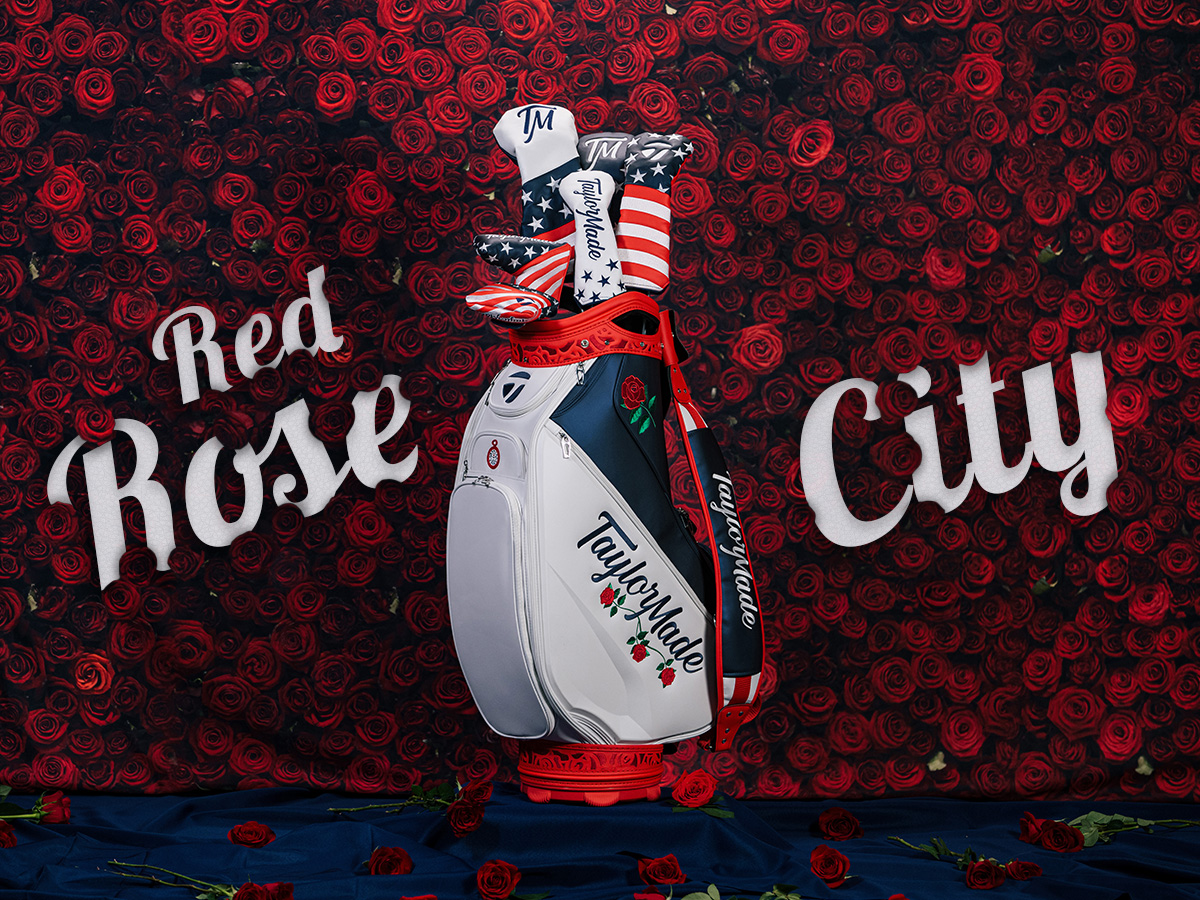 'Red Rose City' in white cursive letters on a background that is covered in roses. In the center is the Women's Summer Commemorative Staff Bag filled with the accompanying headcovers.