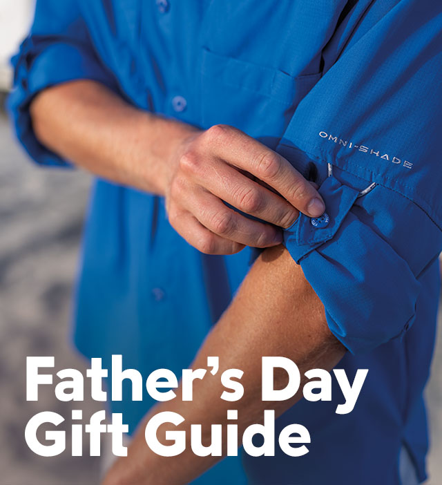 A man rolling up the sleeves on his blue fishing shirt with headline Father's Day Gift Guide.